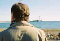 My dad, looking at Mackinac Bridge.